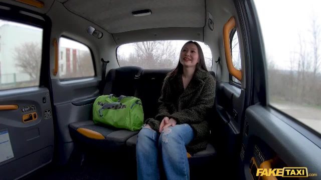 Fake Taxi Horny Asian MILF strips into her gym outfit before riding a big cock - 1